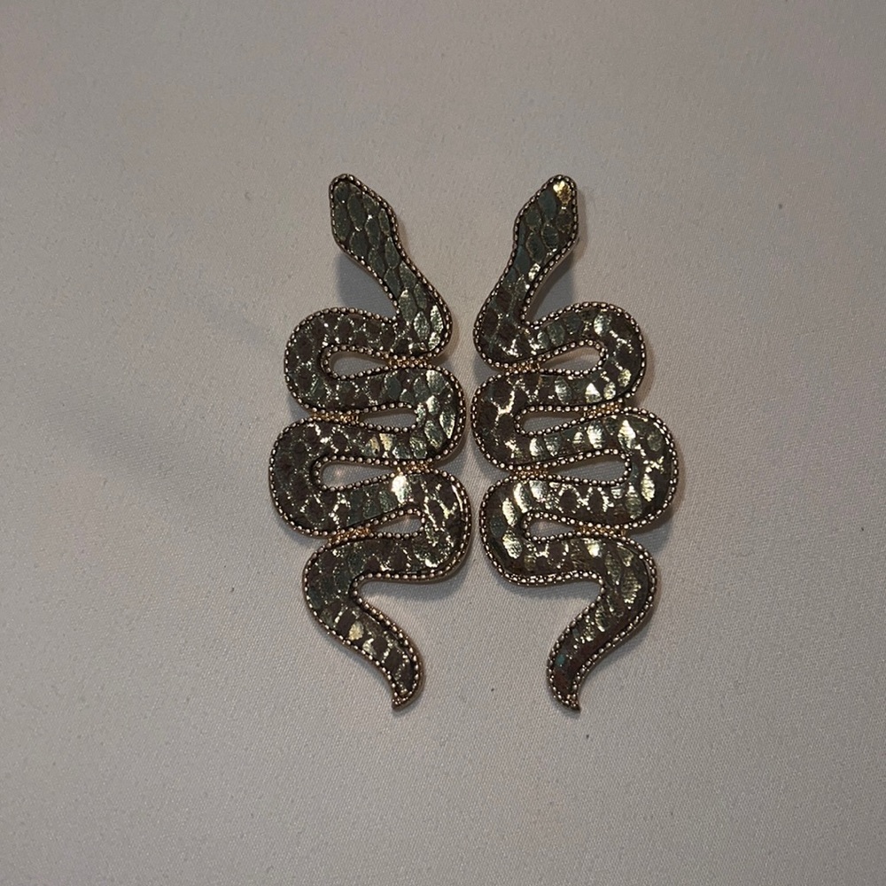 Snake Earrings. Shimmery gold and brown leather material.